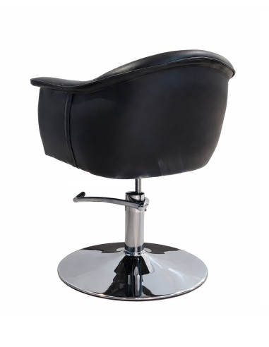 Parturi-kampaajan asiakastuoli...